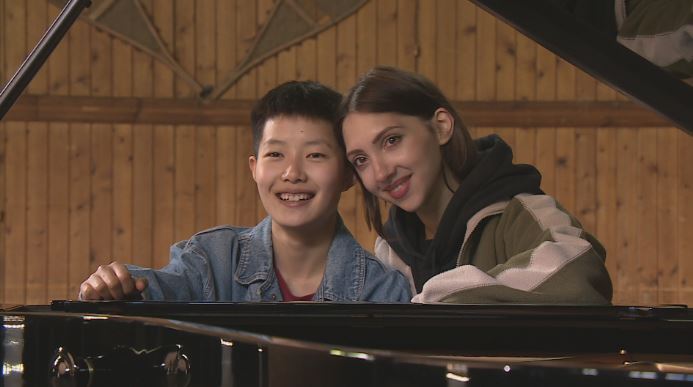 The pair say their love of music helps them deal with the pain of having to leave their homeland.