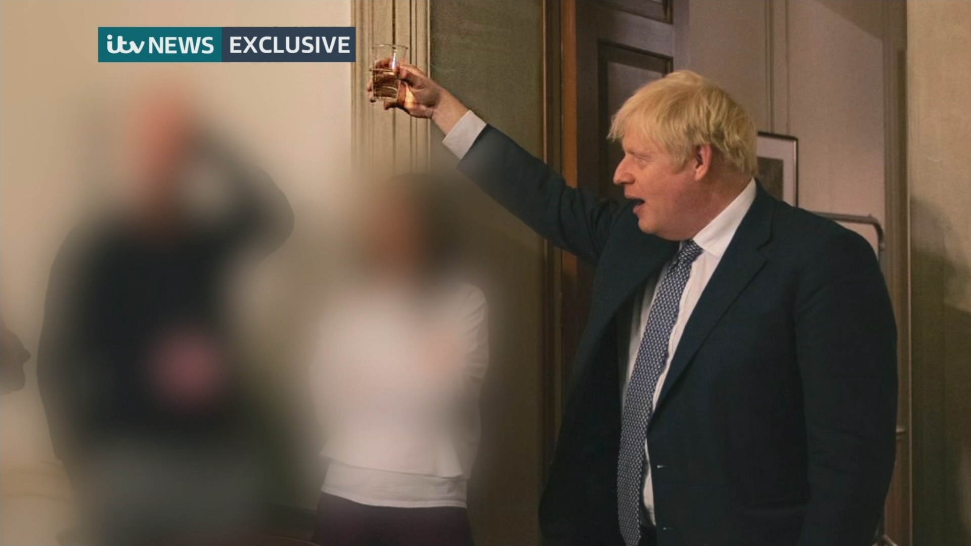 Boris Johnson was pictured drinking at Downing Street party during lockdown. (ITV News)