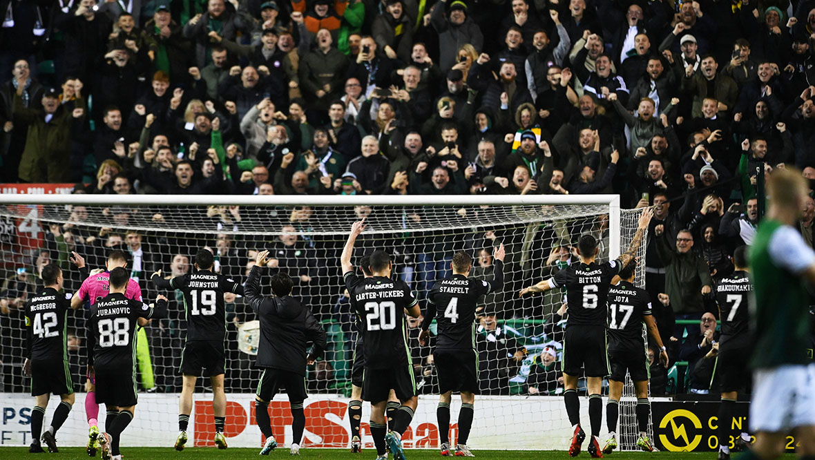 Celtic players celebrating with the travelling support at Easter Road.