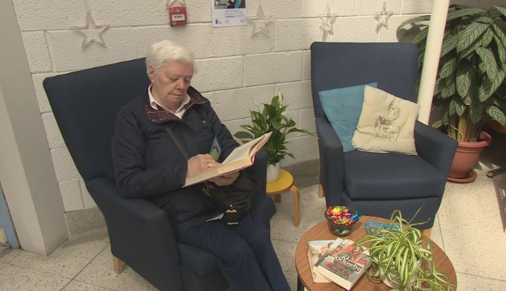 Betty McKay enjoys a book at Central Library in Dundee.