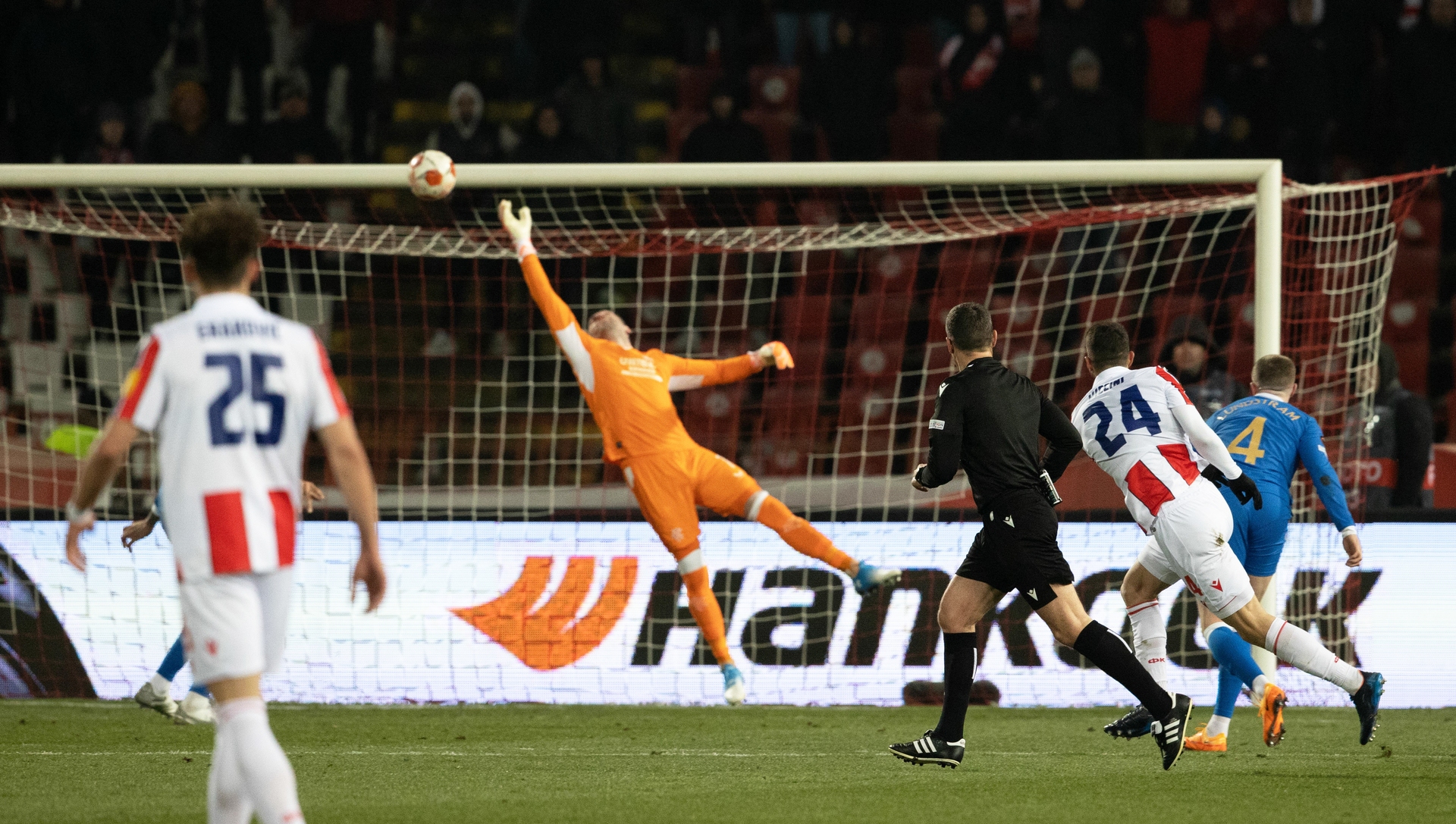 Allan McGregor makes a save from Cristiano Piccini during the Red Star Belgrade game.