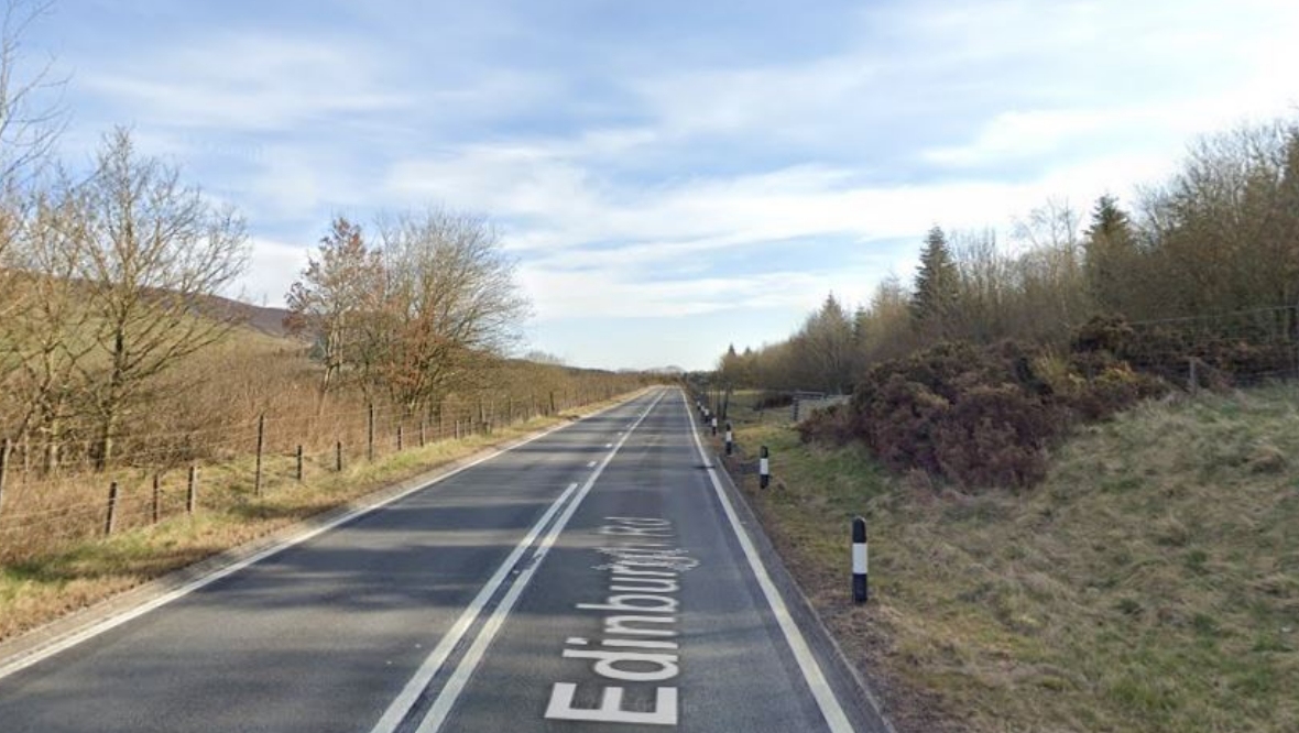 Man riding motorbike dies following collision with lorry on the A702, near Elsrickle, South Lanarkshire
