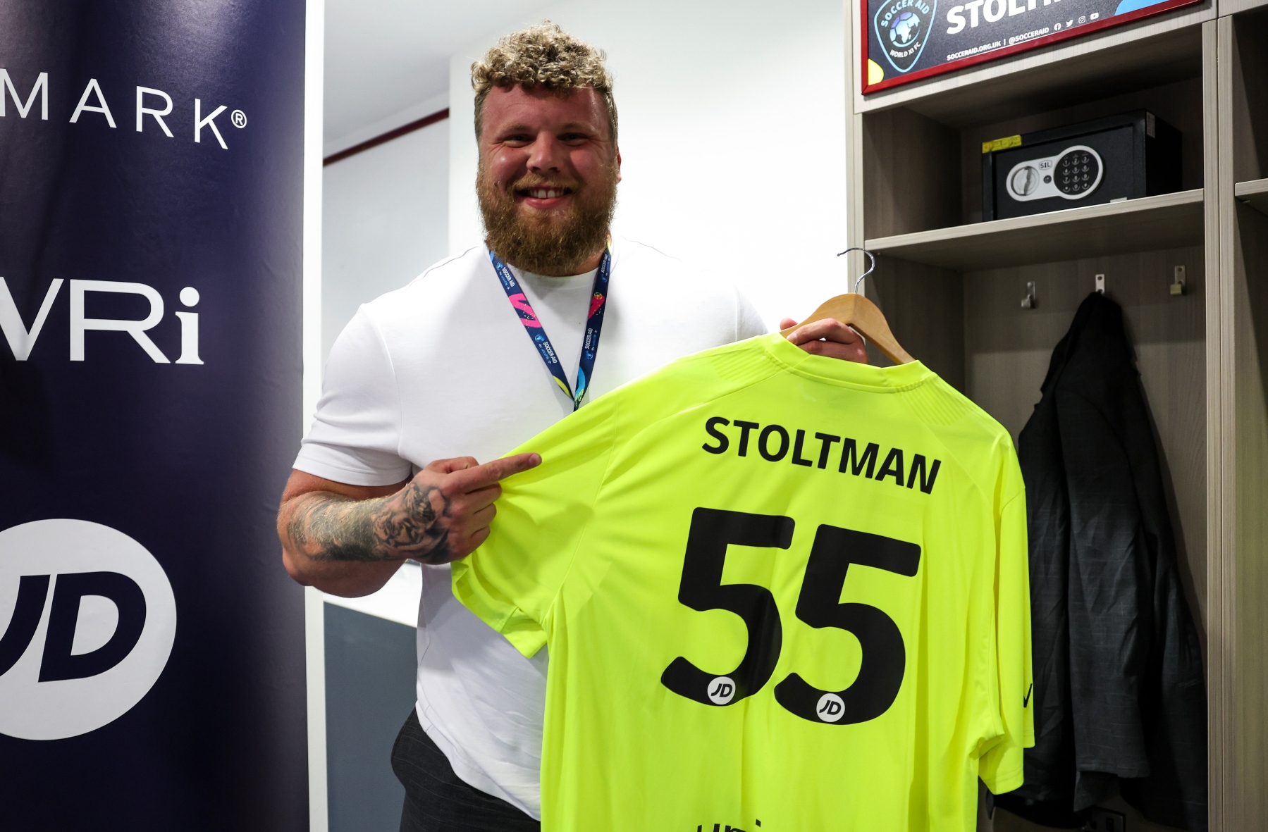 Rangers fan Stoltman played under number 55, as tribute to the Ibrox side's 55th premiership title last year. 
