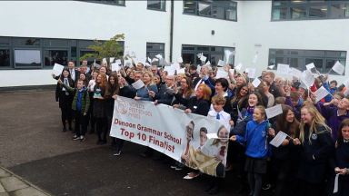 Pupils and staff celebrate after school reaches top ten in competition for best in the world