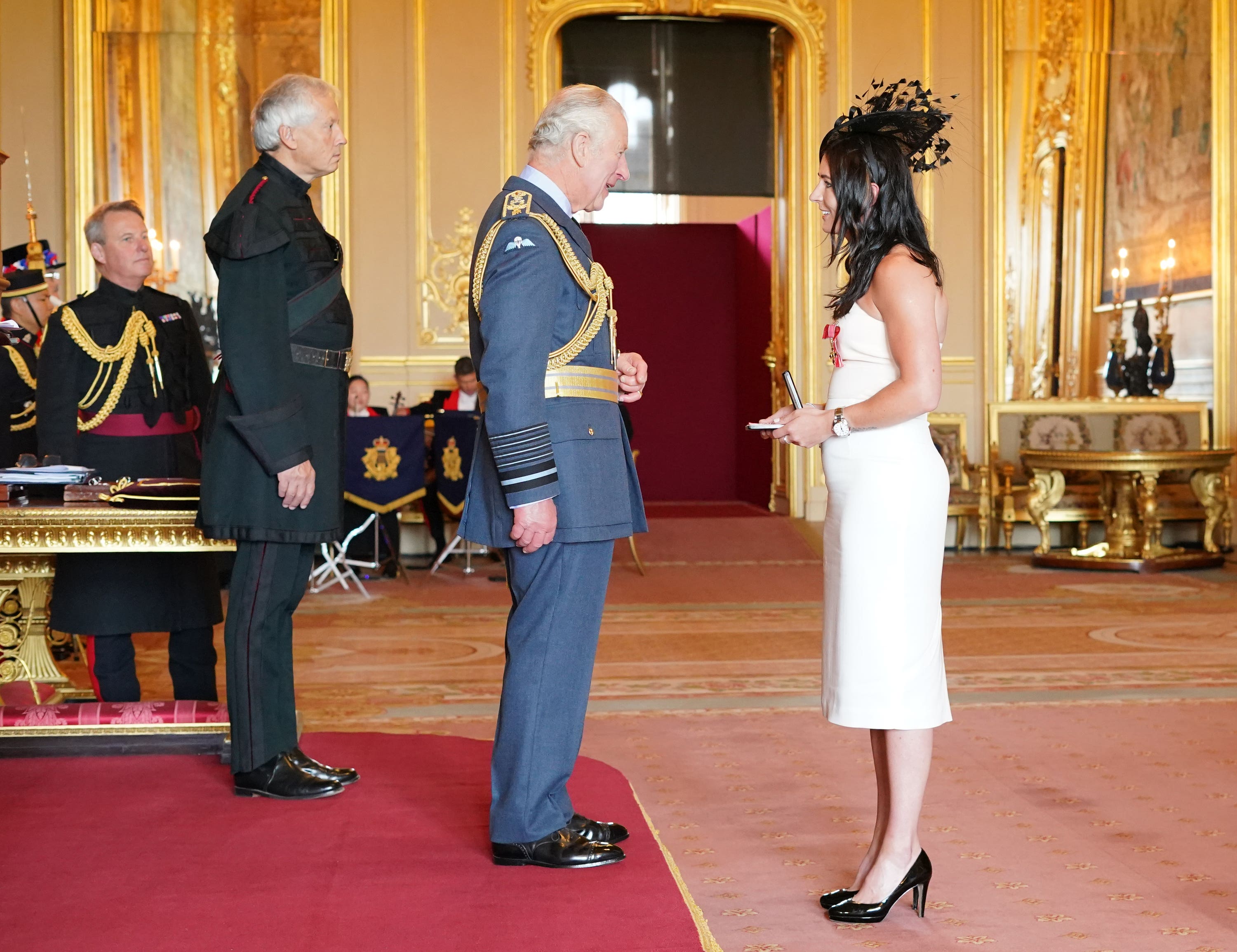 Eve Muirhead is made an MBE and an OBE by the Prince of Wales at Windsor Castle.