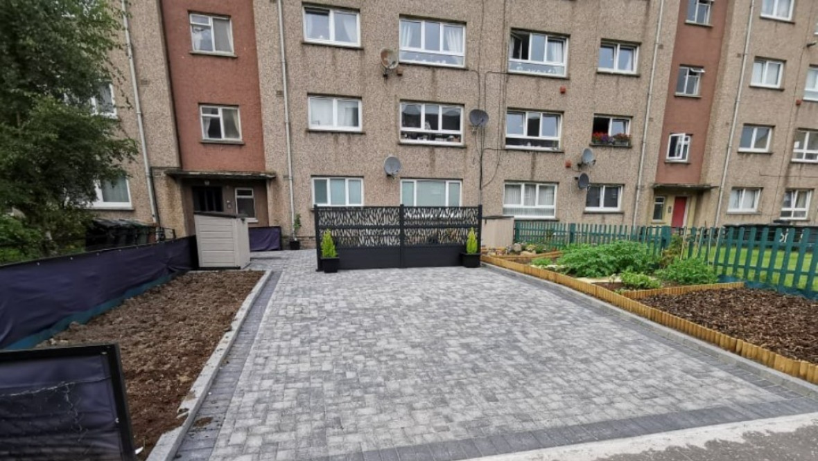 Disabled Edinburgh resident wins right to keep driveway in front garden of Magdalene Drive flat