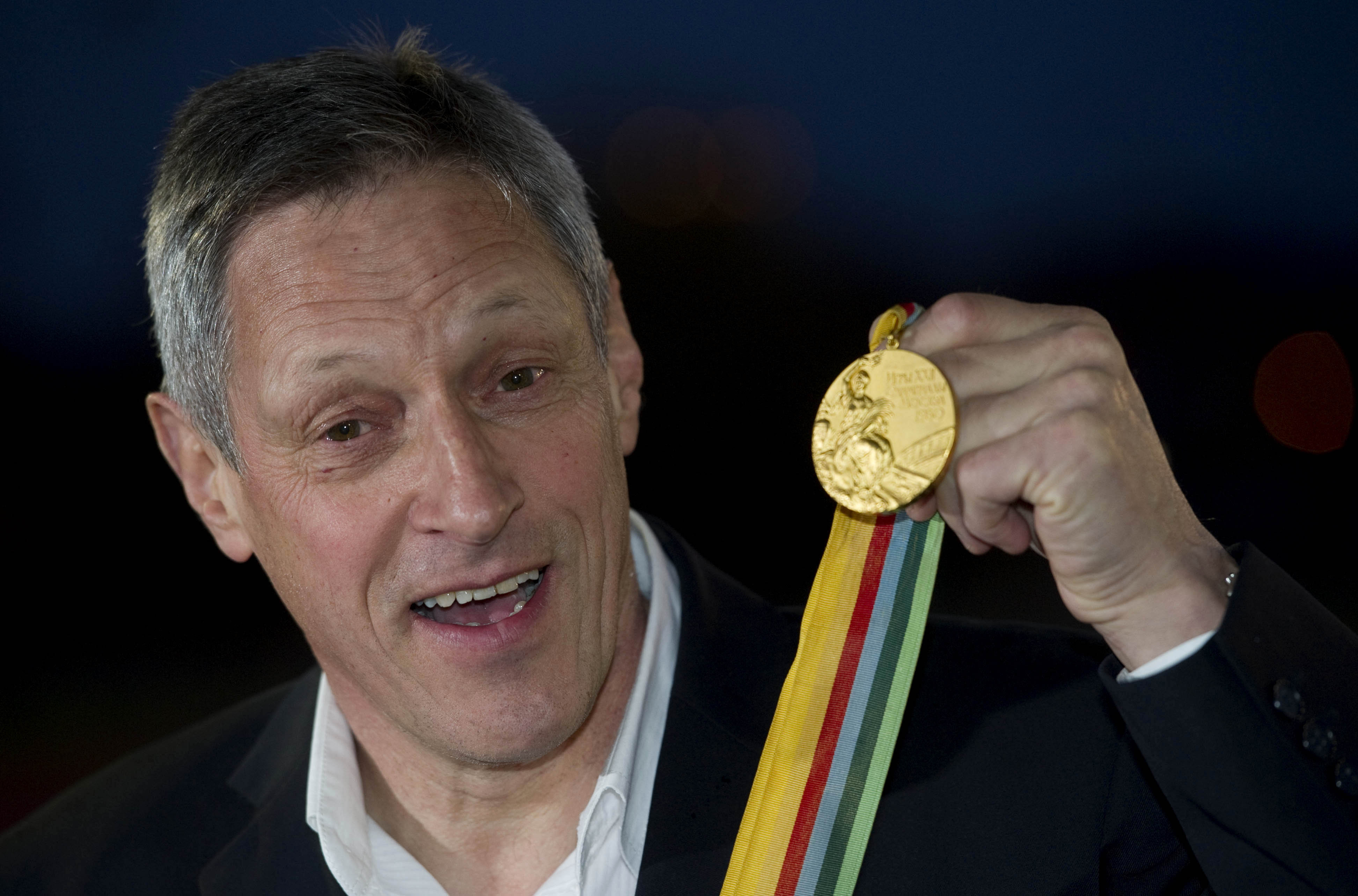 Wells with his gold medal from the 1980 Olympics in Moscow.
