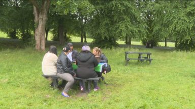 Picnic benches designed to bring Glasgow’s Roma community together have been unveiled in Queens Park