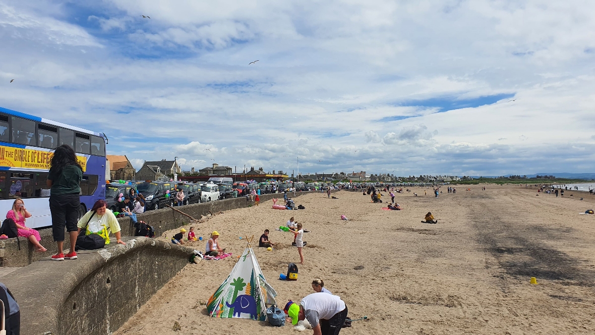 The children are being taken to Troon beach.