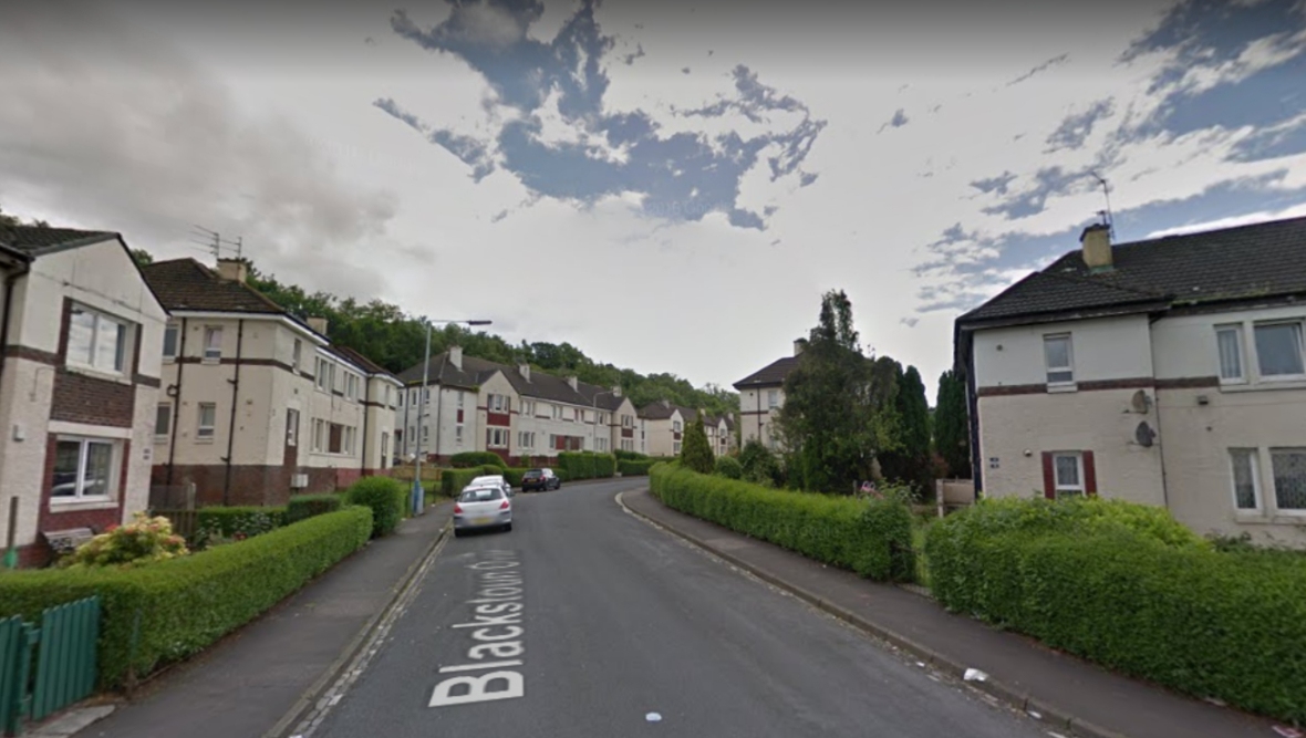 Police launch investigation after front door of flat in Blackstoun Oval in Paisley set on fire
