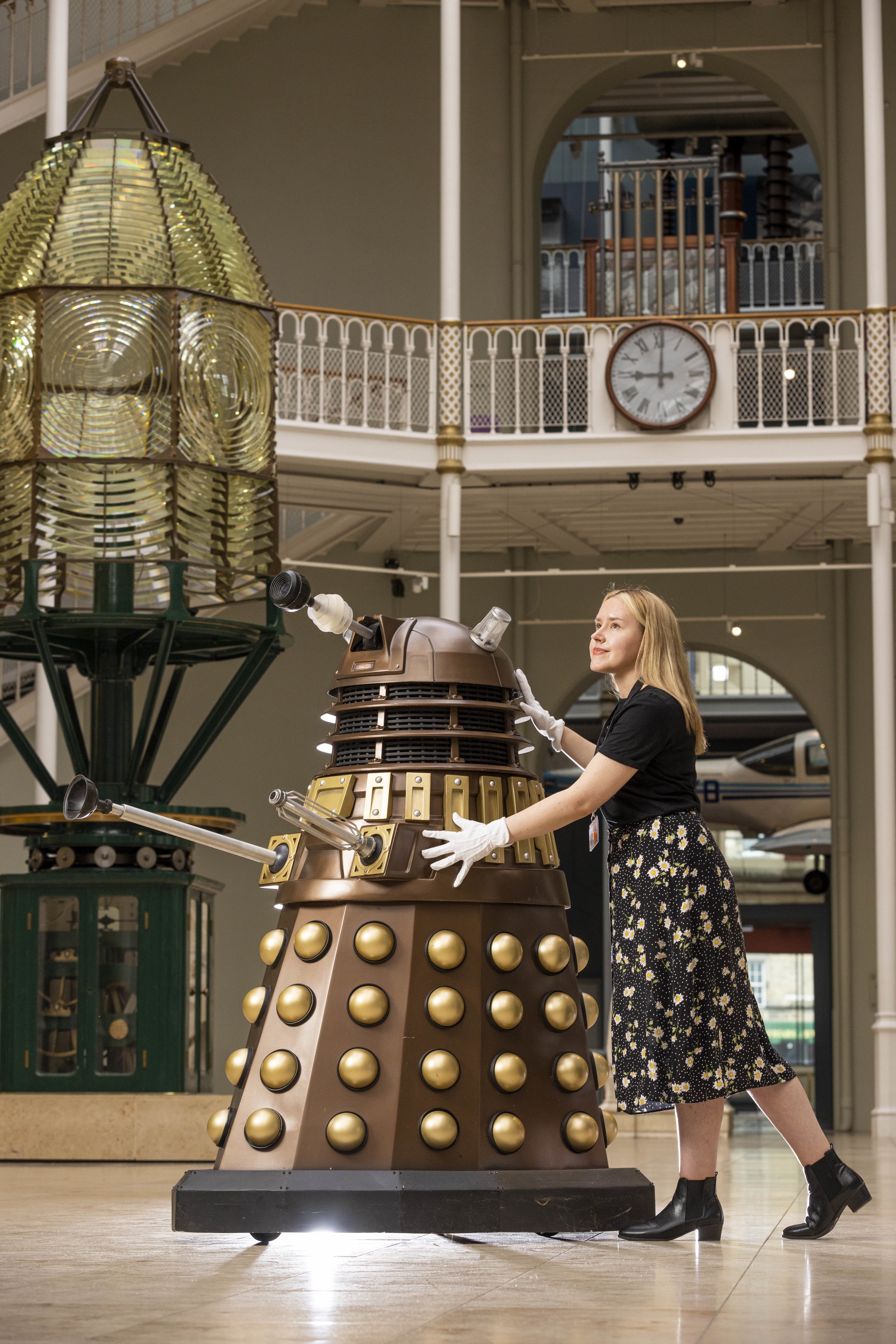 Liv Mullen wheels a Dalek into the National Museum of Scotland ahead of the exhibition.