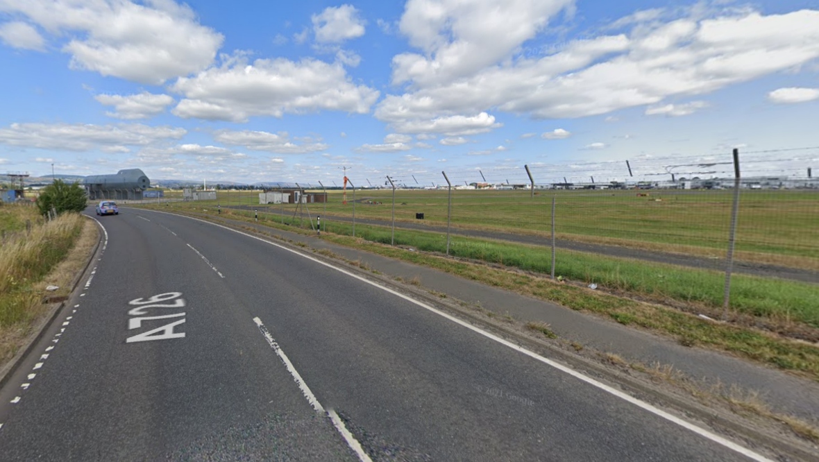 Motorcyclist seriously injured after crashing into fence on Barnsford Road near Glasgow Airport