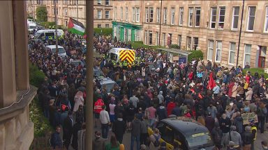 Three people are to stand trial following a mass demonstration held on Glasgow’s Kenmure Street