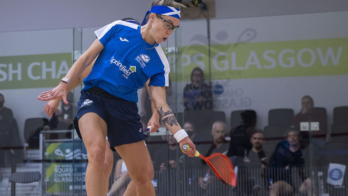 Lisa Aitken playing in the World Doubles Squash Championships.