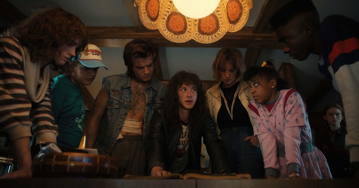 Natalia Dyer as Nancy Wheeler, Gaten Matarazzo as Dustin Henderson, Joe Keery as Steve Harrington, Joseph Quinn as Eddie Munson, Maya Hawke as Robin Buckley, Priah Ferguson as Erica Sinclair, Sadie Sink as Max Mayfield, and Caleb McLaughlin as Lucas Sinclair in Stranger Things.