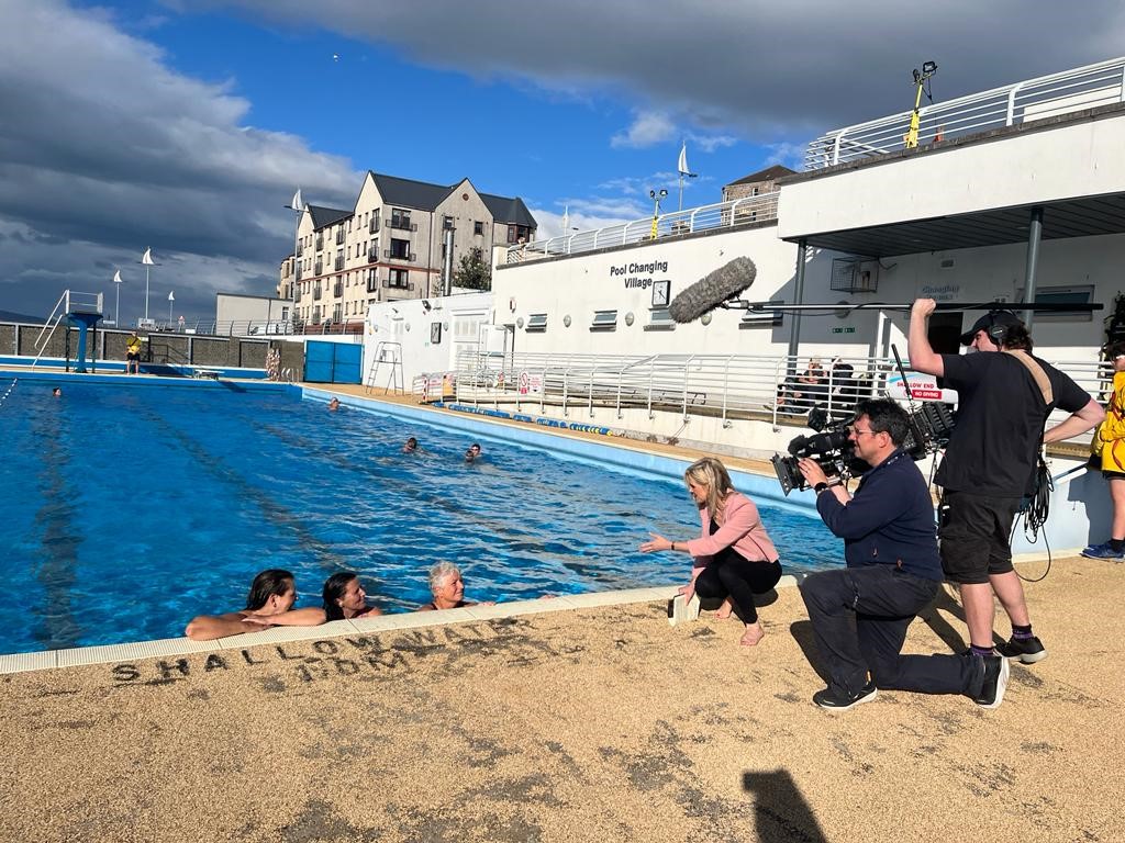 Swimmers being interviewed at the pool in Gourock. 