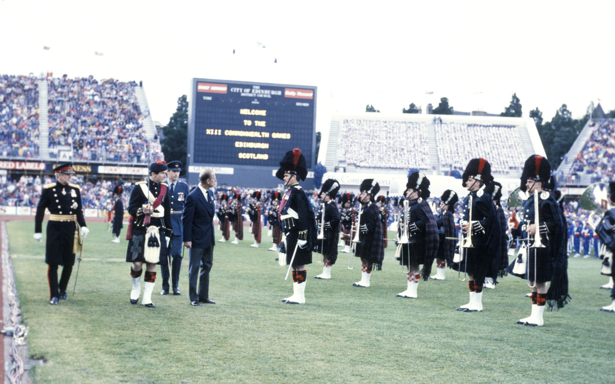 Daily Mirror and Daily Record adverts adorned the scoreboard as the Duke of Edinburgh attended the opening ceremony at Meadowbank Stadium.