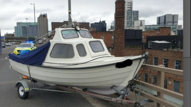 Traffic disruption after boat abandoned on M8, Kingston Bridge, Glasgow