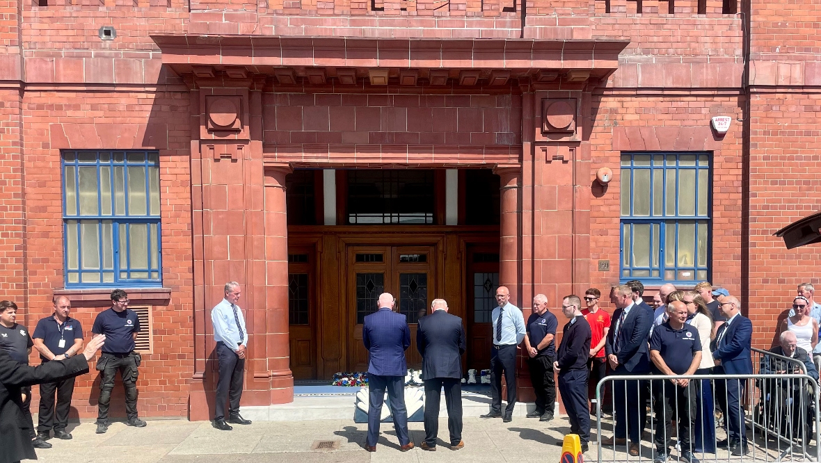 Ally McCoist and John Brown paid tribute at the doors of Ibrox. 