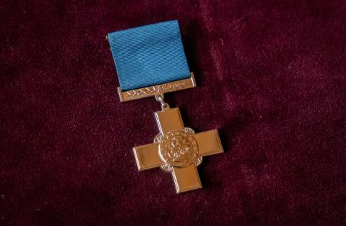 The George Cross medal was awarded to the NHS at Windsor Castle on Tuesday.