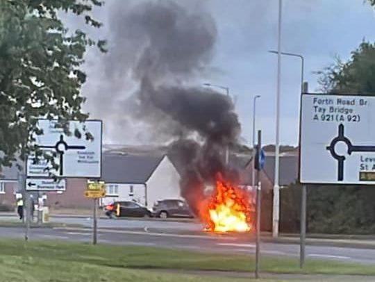 The car began by emitting light smoke before bursting into flames. 