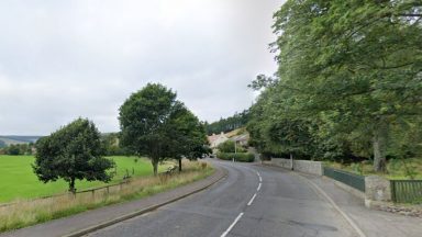 Motorcyclist dies in crash with flatbed truck on A7 near Stow in Scottish Borders
