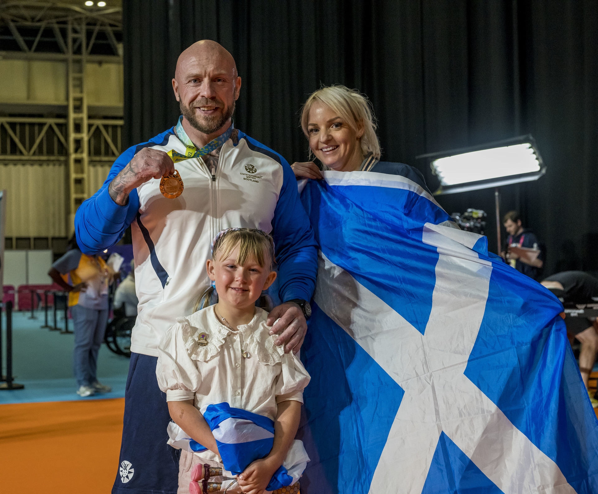 Micky Yule celebrates with his family.