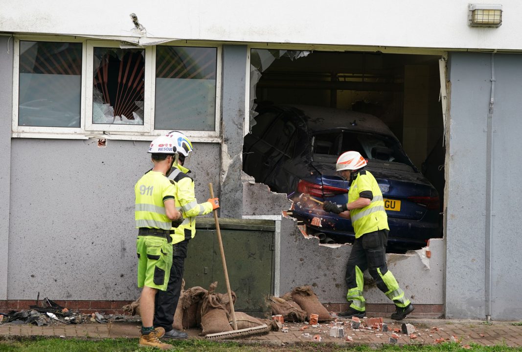 Driver arrested after car crashes through wall of Paisley block of flats