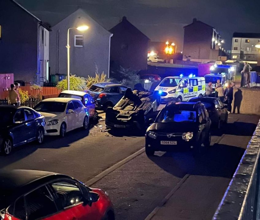 'Pure carnage' Man arrested after car landed on its roof in crash at