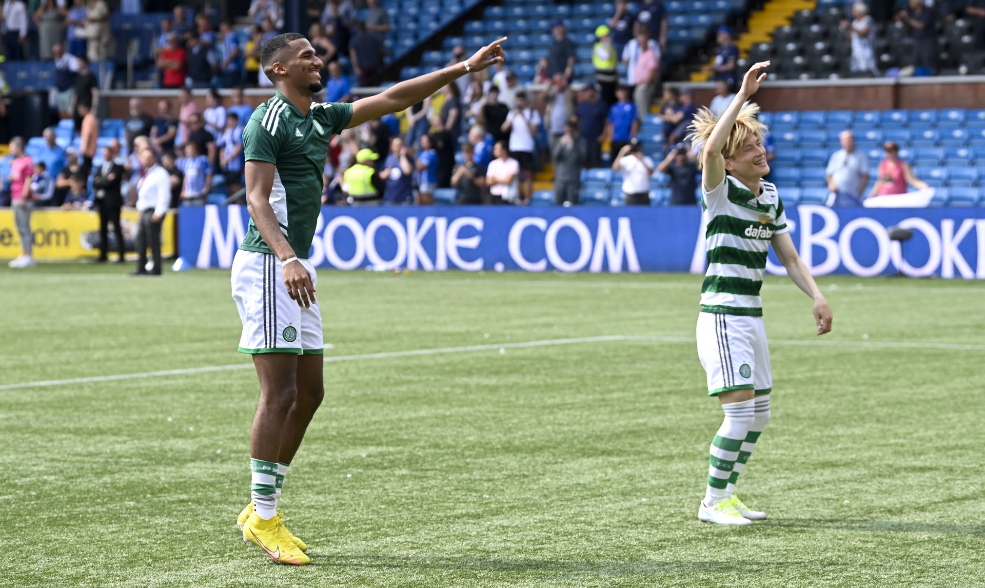 Kilmarnock 0-5 Celtic: Kyogo and Jenz celebrate win with fans.