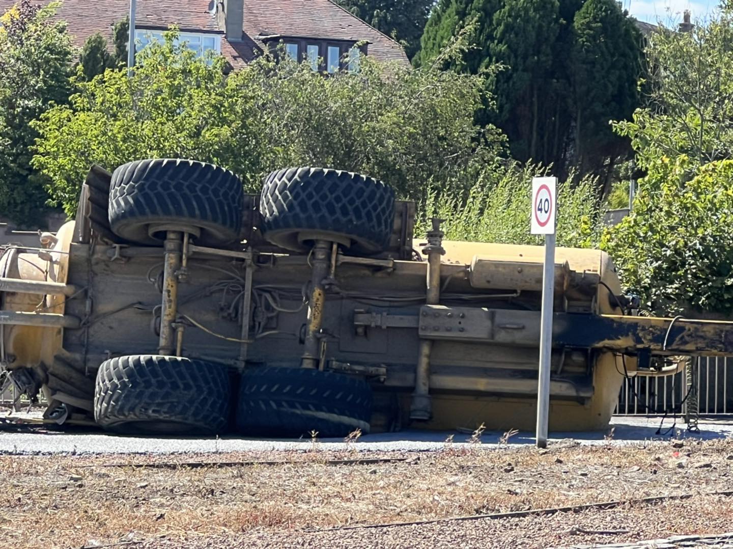 The tanker toppled over and spilled its contents. 