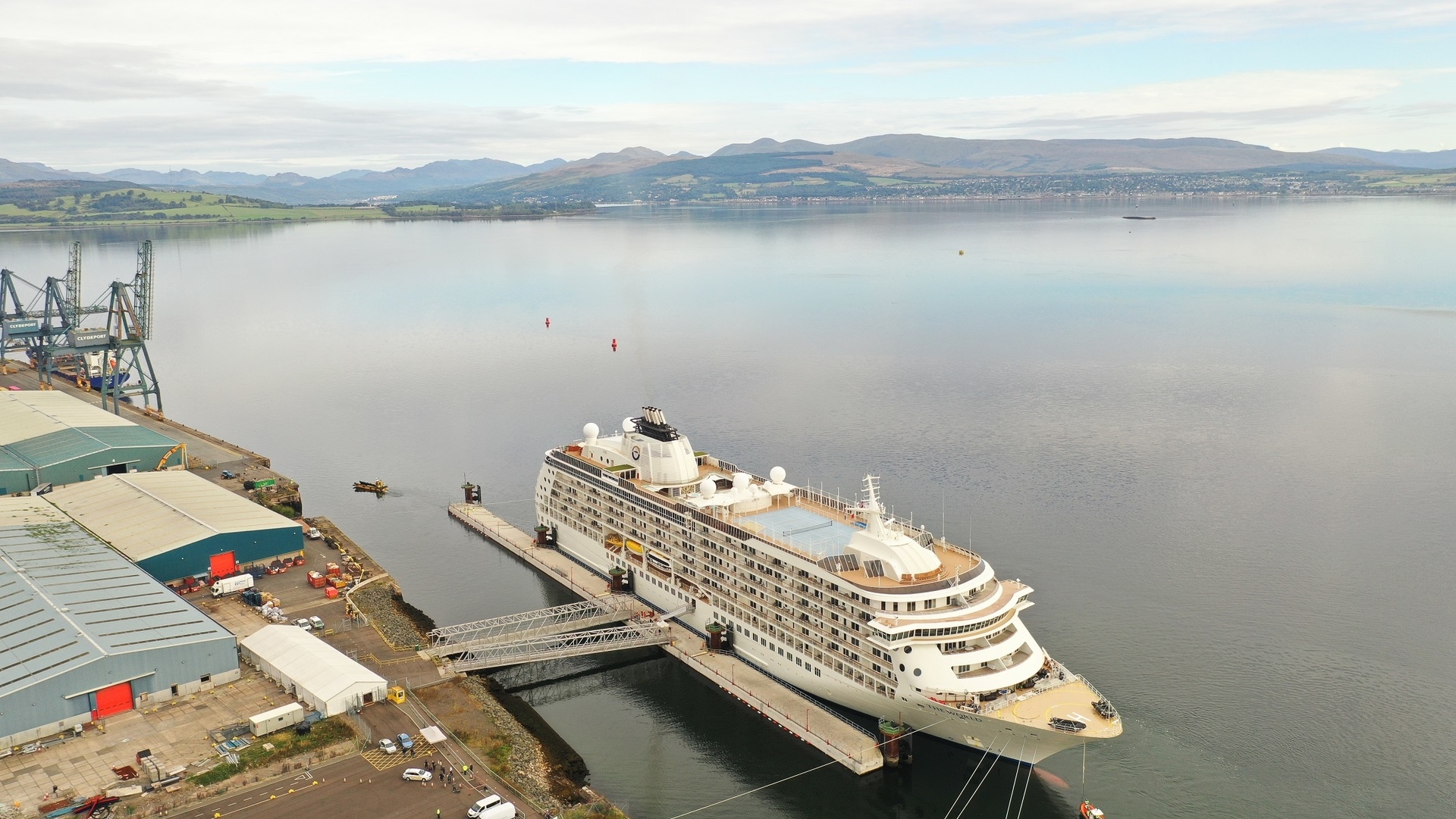 The ship is docked at Greenock Ocean Terminal.