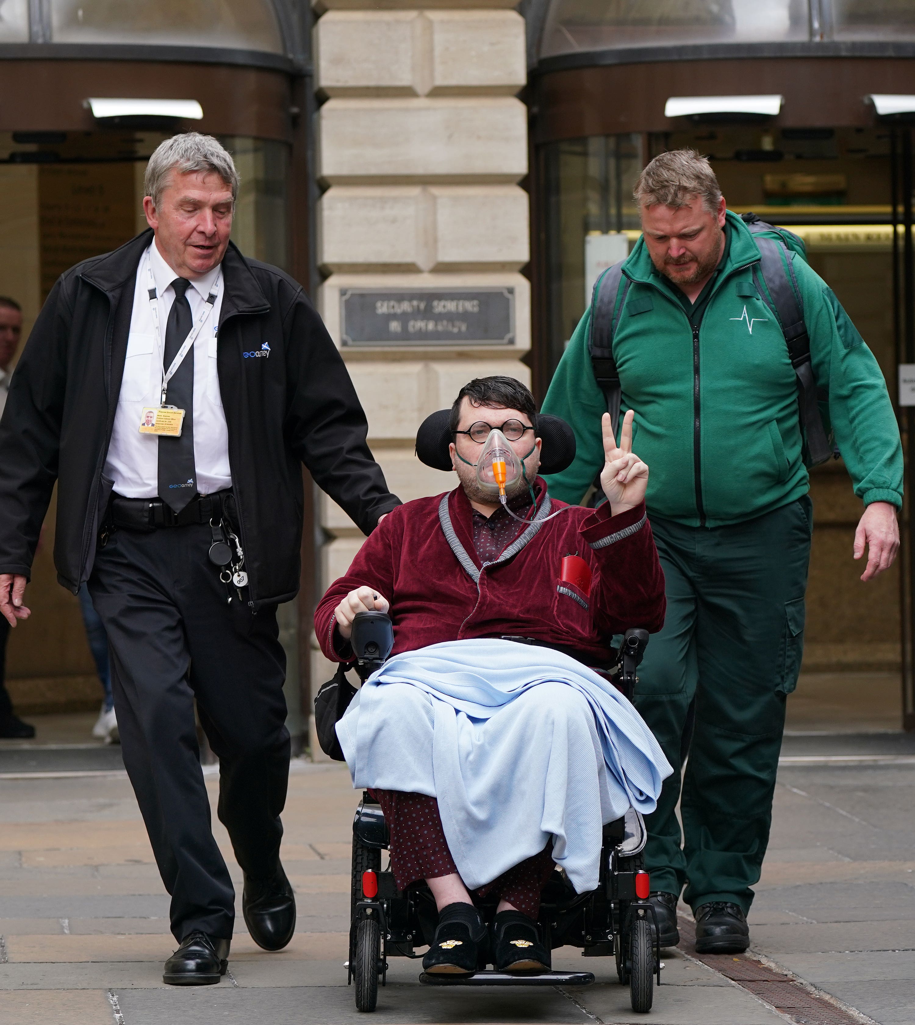 The defendant leaving court after a hearing in July.