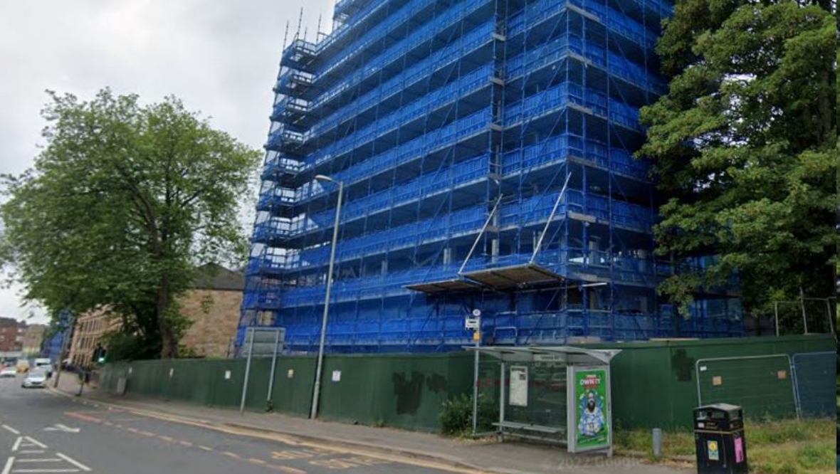 Man dies after falling from scaffolding at flat block development in Glasgow