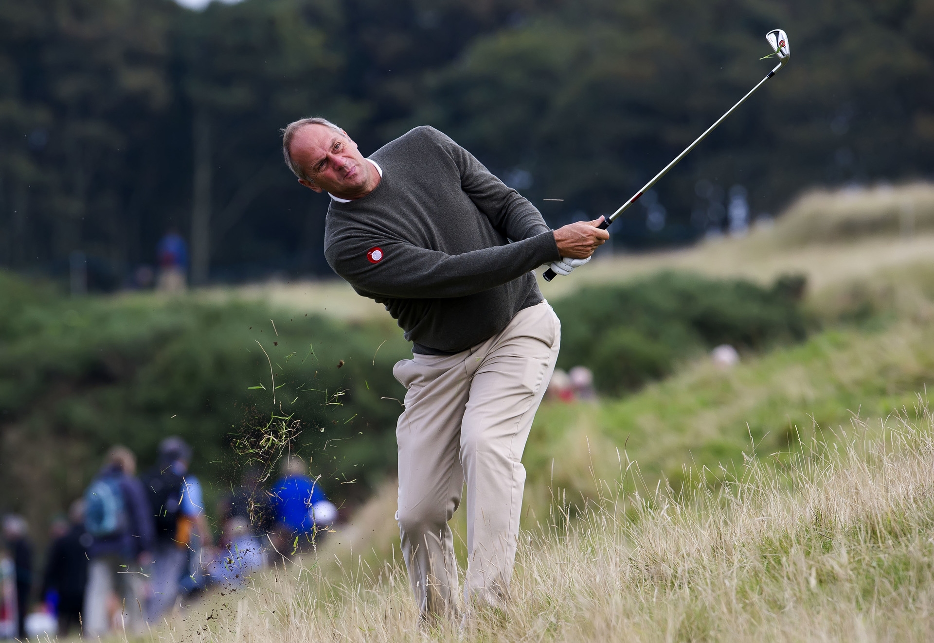 Sir Steve Redgrave tries to escape the rough at Kingsbarns in 2013.