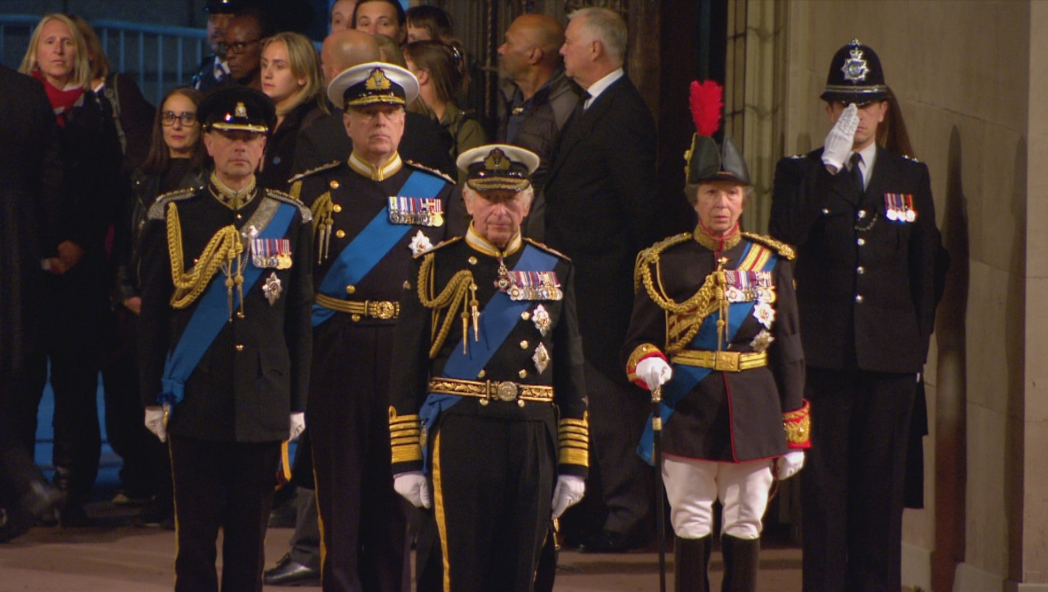 The Queen's four children all wore uniforms at the vigil. 