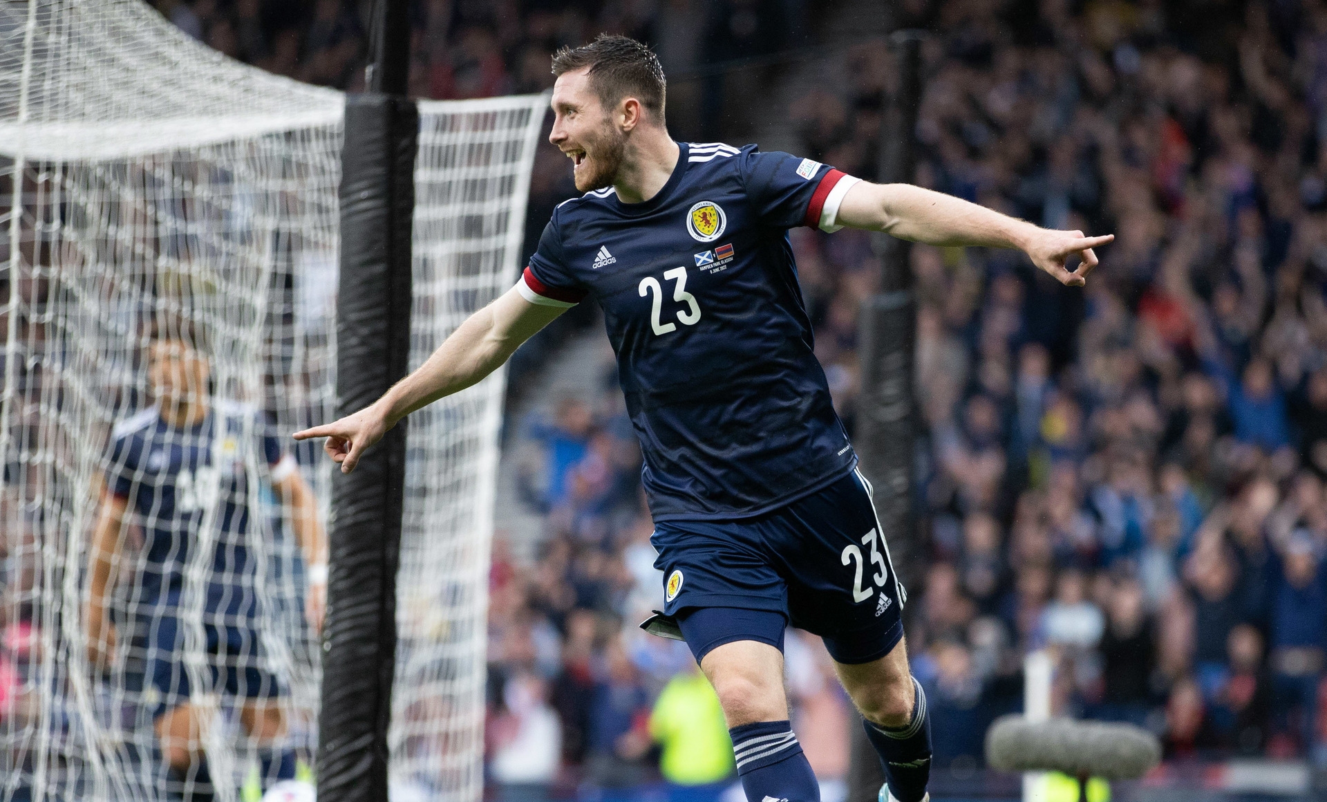 Anthony Ralston celebrates his first international goal after heading home at the back post.