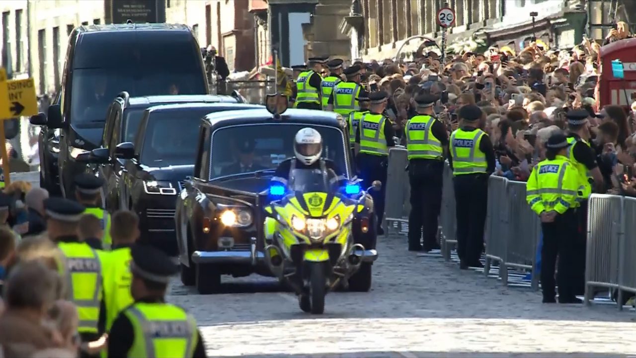 Police criticised for arrests during events to mark Queen’s death as four people charged in Scotland