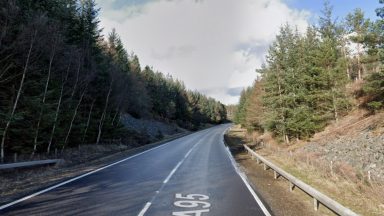 Woman killed in car crash with articulated lorry on A95 in the Highlands