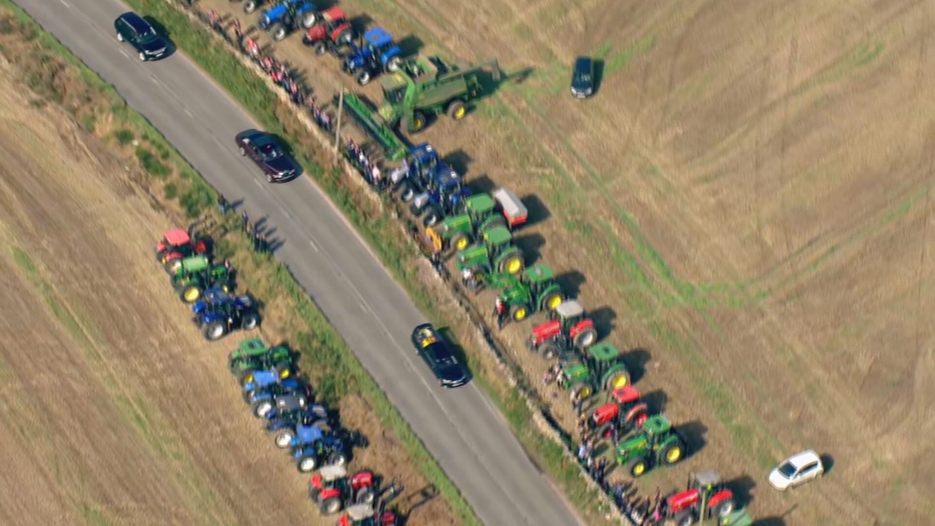 Tractors lined up in a guard of honour as the coffin passed through parts of rural Aberdeenshire.