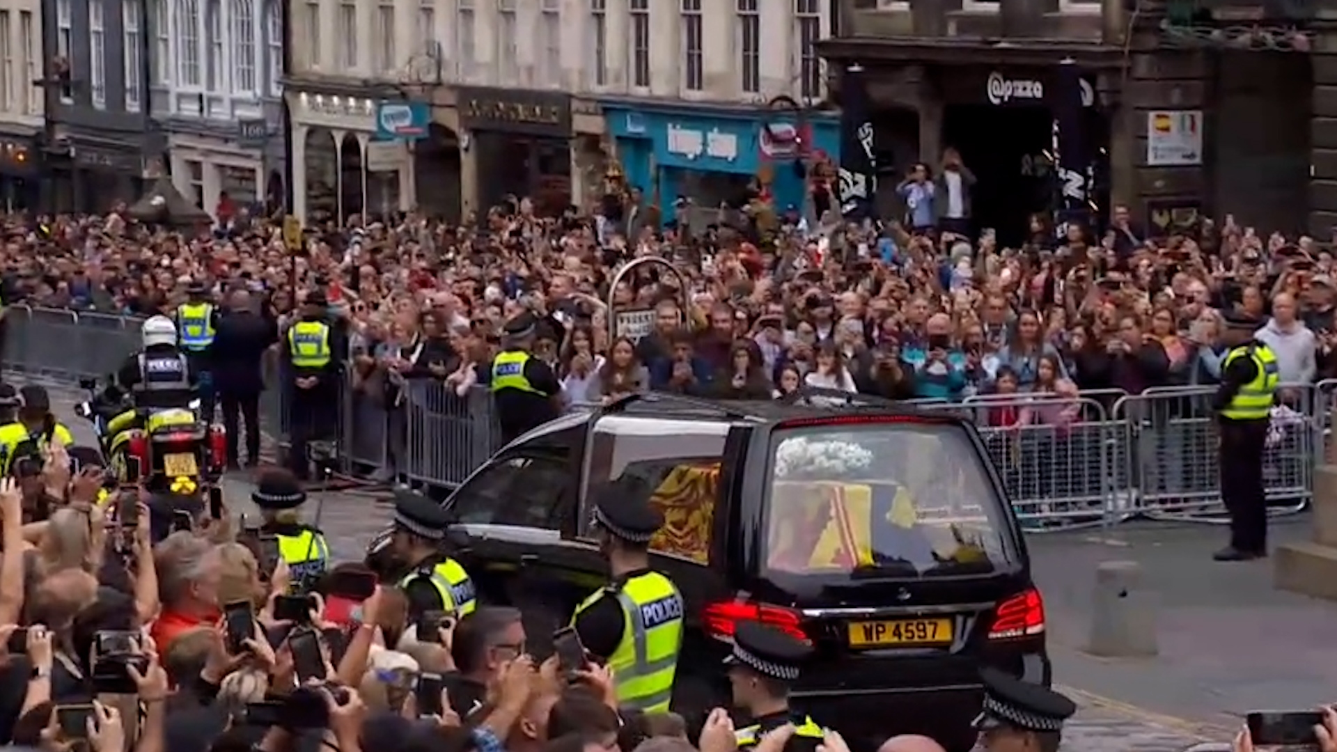 Queen's funeral cortege travelling down Royal Mile.