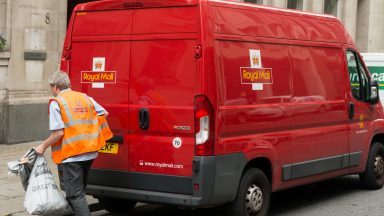 Two-day strike continues by Royal Mail postal workers in dispute over pay and conditions