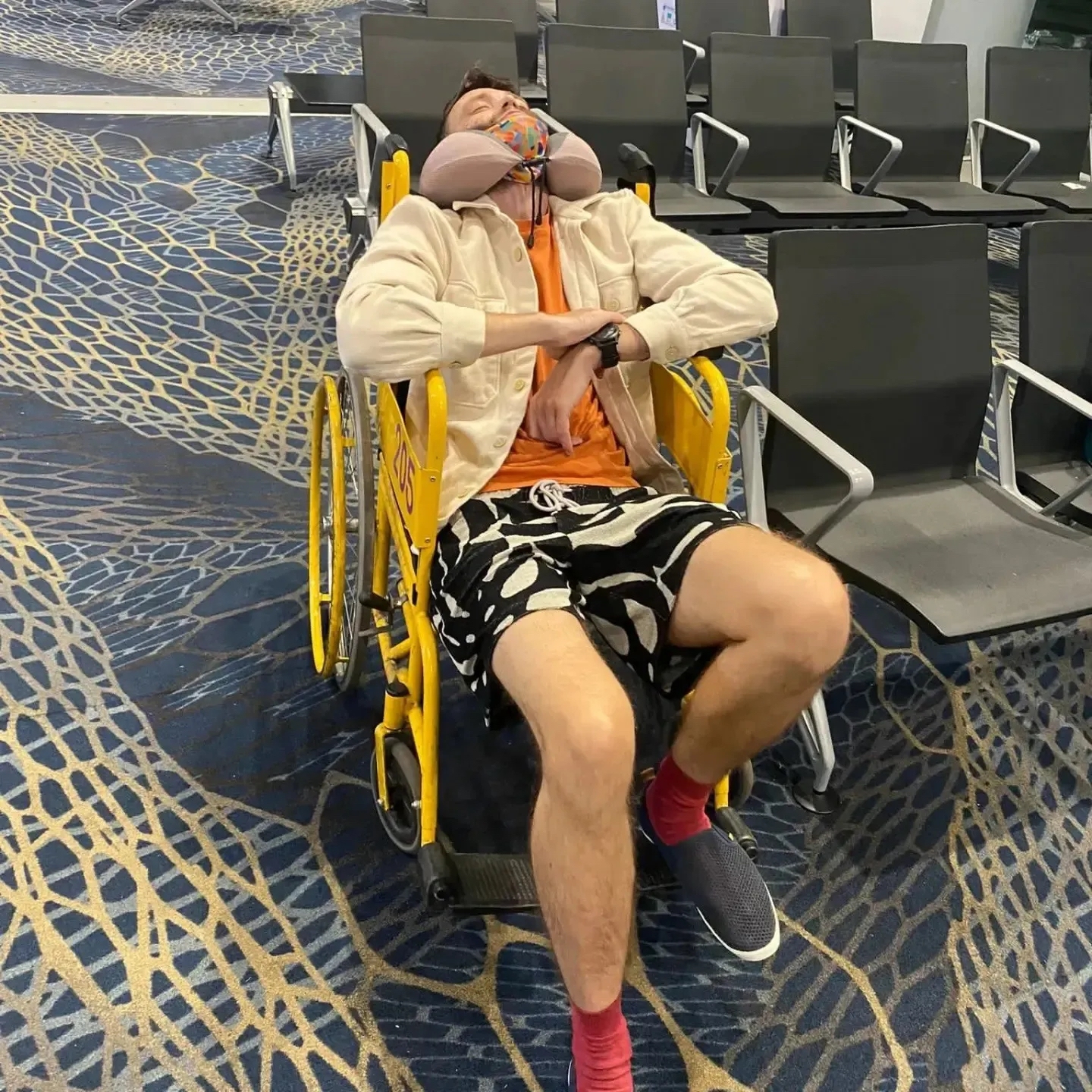 Fraser resting in the airport.
