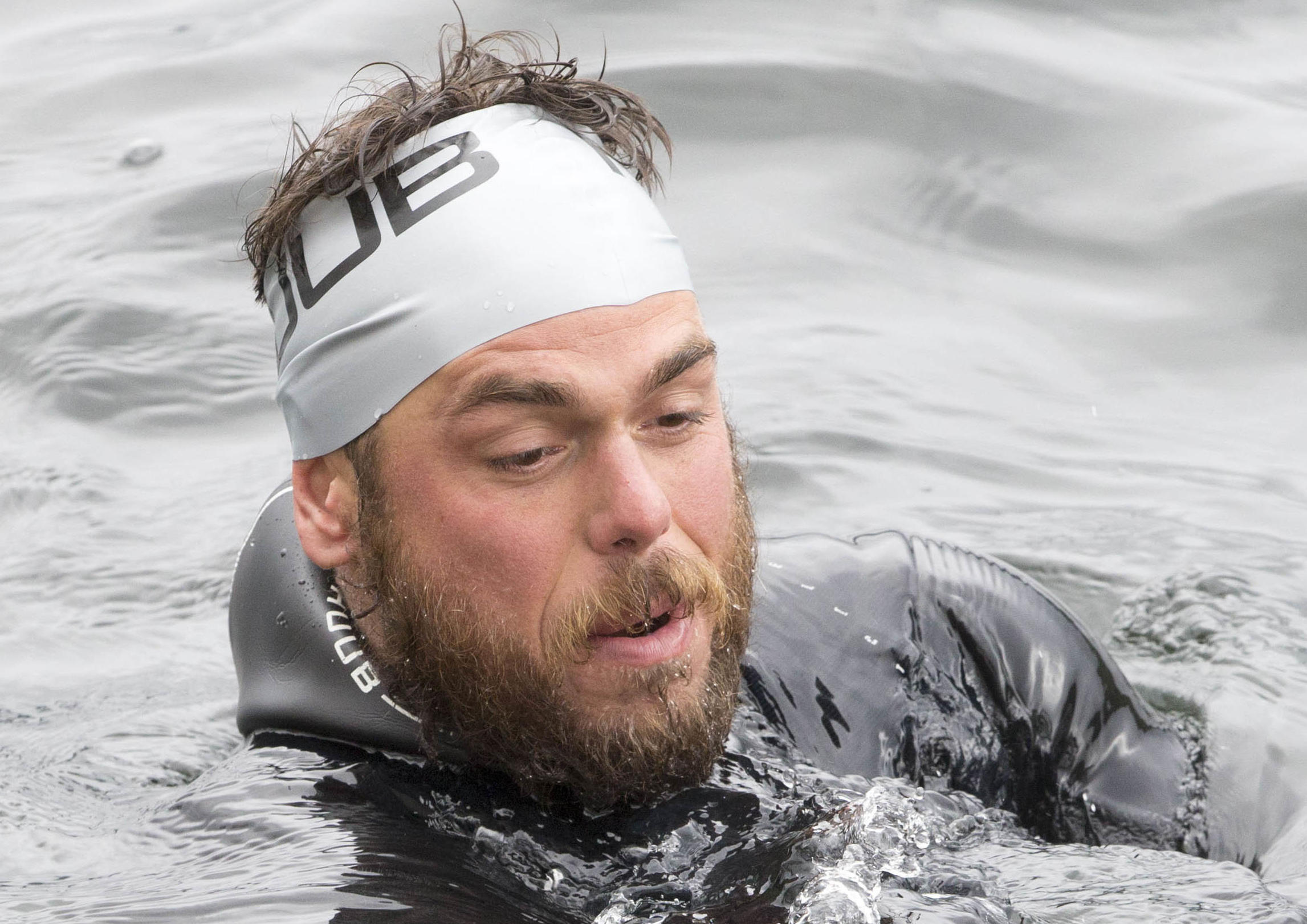 He now feels like a 'captive goldfish' in swimming pools after becoming the first swimmer to circumnavigate Great Britain.