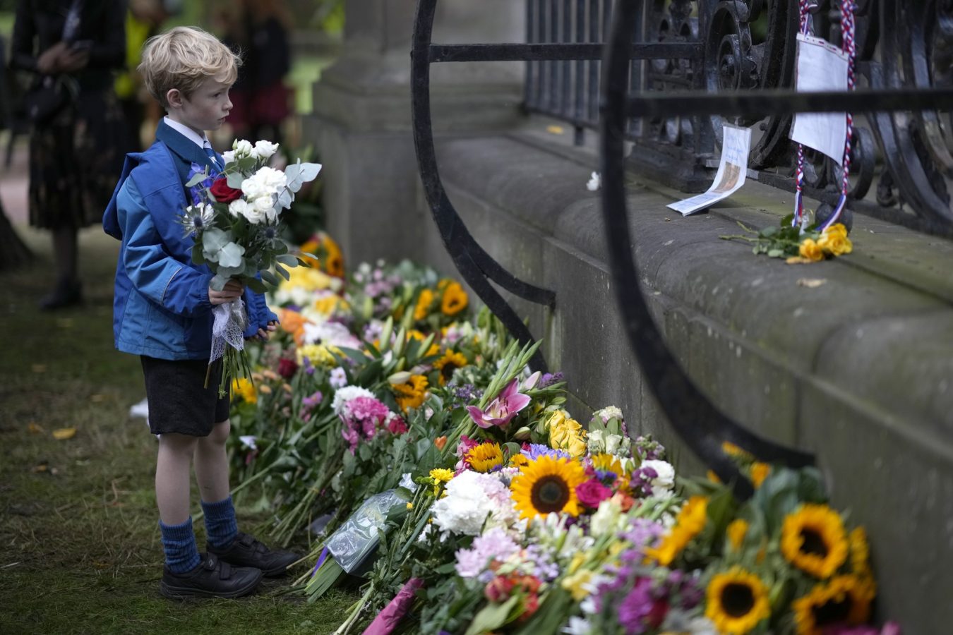 Flowers have been left at the gates of Holyroodhouse.