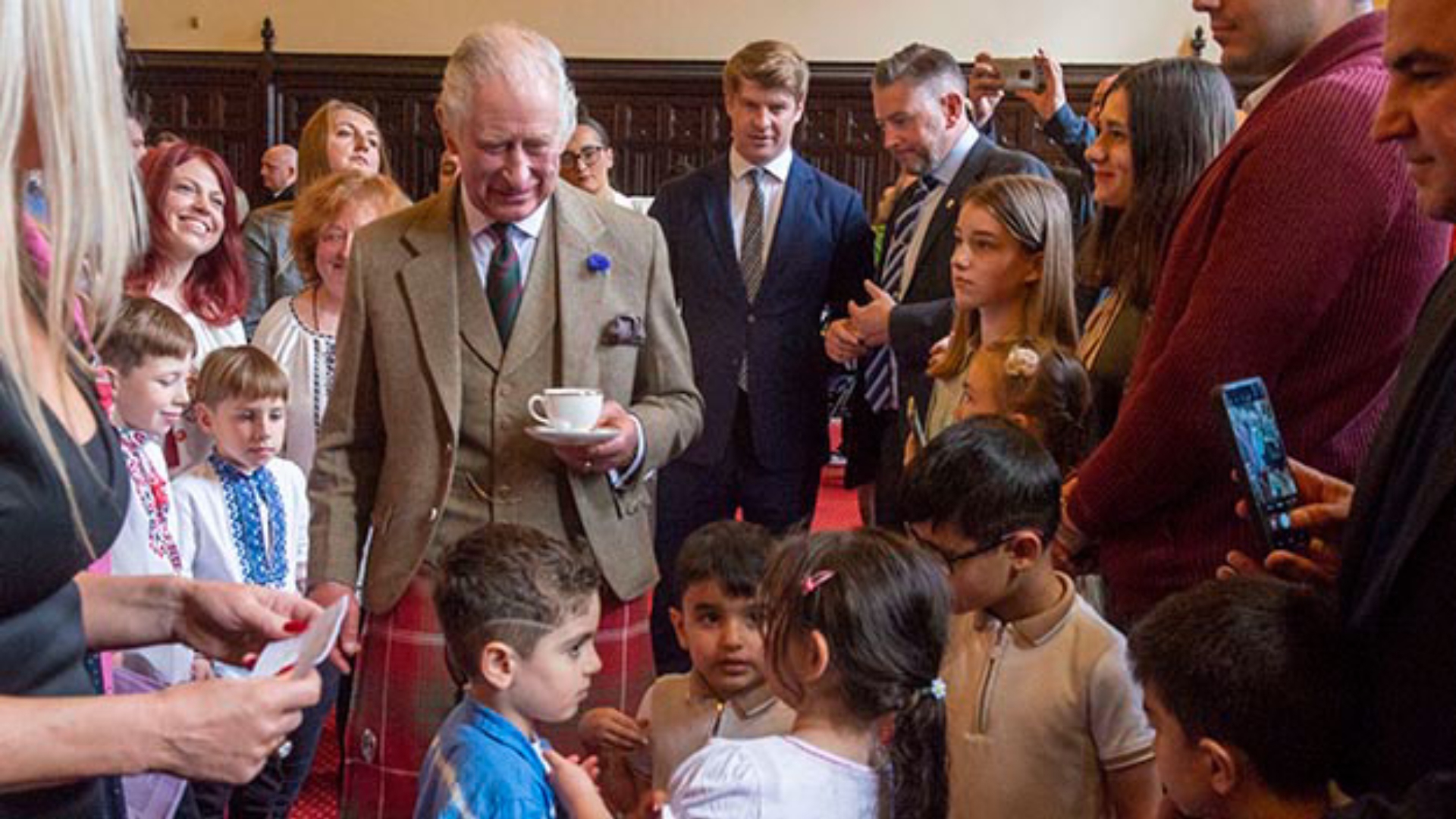 King Charles III on a visit to Aberdeen to meet families forced to flee their country because of conflict – and to thank the city for providing a place of refuge and humanitarian aid.