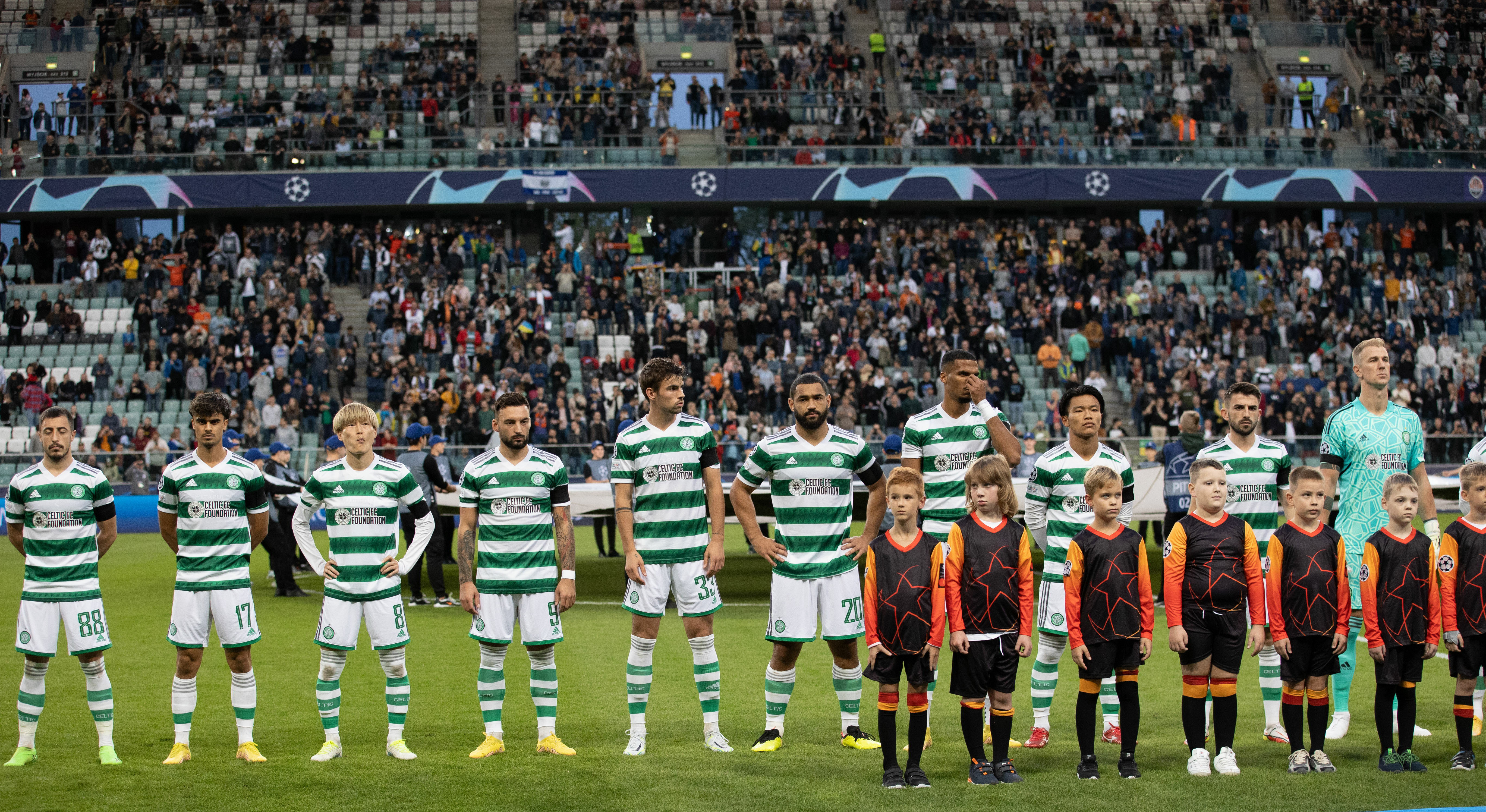 WARSAW, POLAND - SEPTEMBER 14: Celtic players line up for the Champions league anthem during a UEFA Champions League match between FC Shakhtar Donetsk and Celtic at the Stadion Wojska Polskiego, on September 14, 2022, in Warsaw, Poland. (Photo by Craig Williamson / SNS Group)