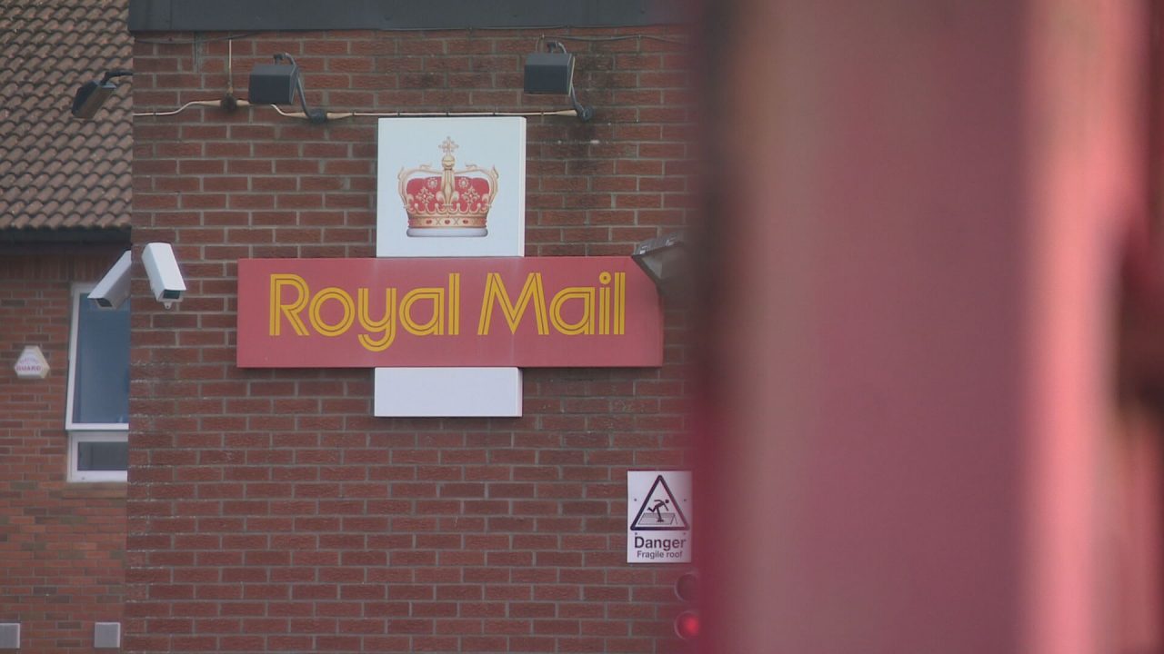 Royal Mail workers call off strikes for fortnight as talks continue