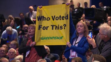Liz Truss speech at Tory conference disrupted by Greenpeace protesters
