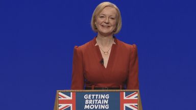 ‘Your time is up’: Truss walks on stage at Tory conference to 1990s song Moving On Up by M People